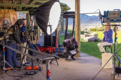 Behind the scenes with the video production crew at an outdoor commercial shoot